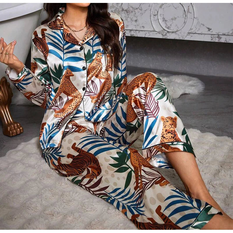 Two piece set of womens pajamas spring and autumn satin printed long sleeved top long pants casual and comfortable home suit set