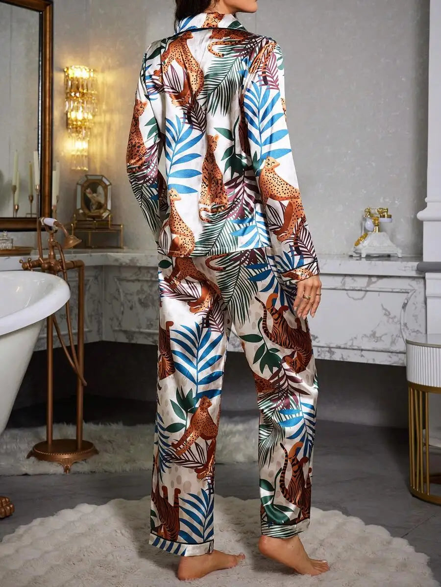 Two piece set of womens pajamas spring and autumn satin printed long sleeved top long pants casual and comfortable home suit set