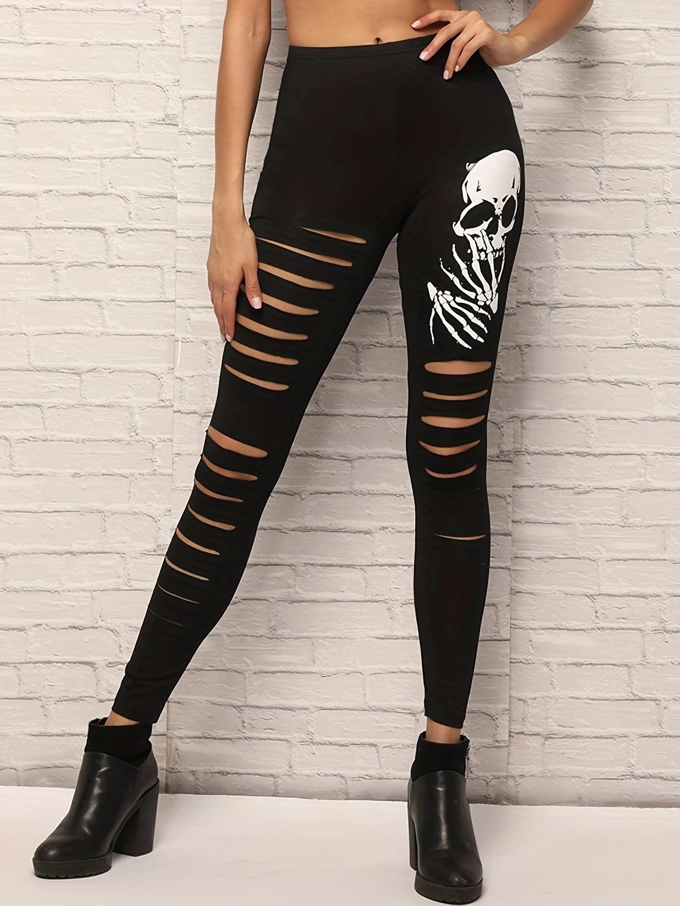 Spring And Summer Hot Selling Ladies Fashion Ripped Leggings Women's Black Tight Nine-point Pants Skull Casual Small Foot Pants