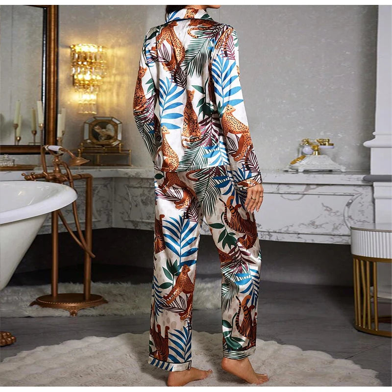 Two piece set of womens pajamas spring and autumn satin printed long sleeved top long pants casual and comfortable home suit set